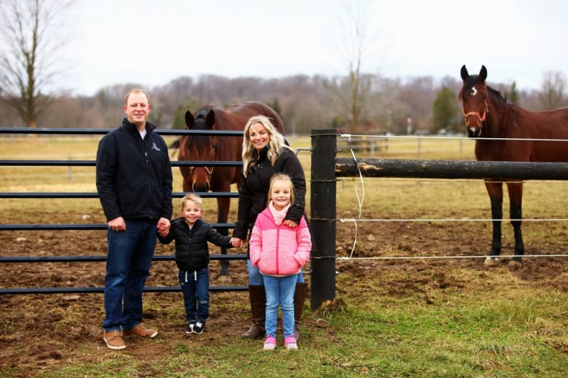 Matt Bax with his wife Ayla, son Tucker and daughter Elliott at the Bax Stables in Campbellville, Ontario.