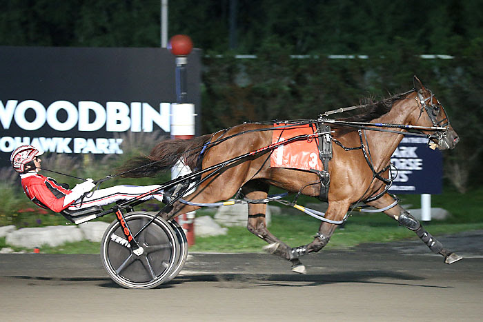 Niki Hill and driver Dexter Dunn cruise to victory in the Shes A Great Lady elimination. (New Image Media)