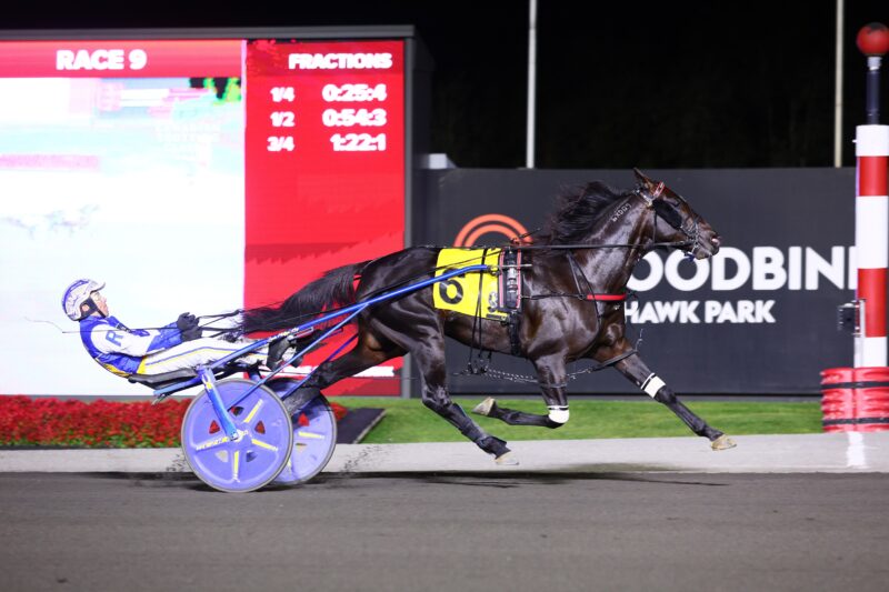 Emoticon Legacy and driver Louis-Philippe Roy winning the Canadian Trotting Classic on September 20, 2025 at Woodbine Mohawk Park (New Image Media)